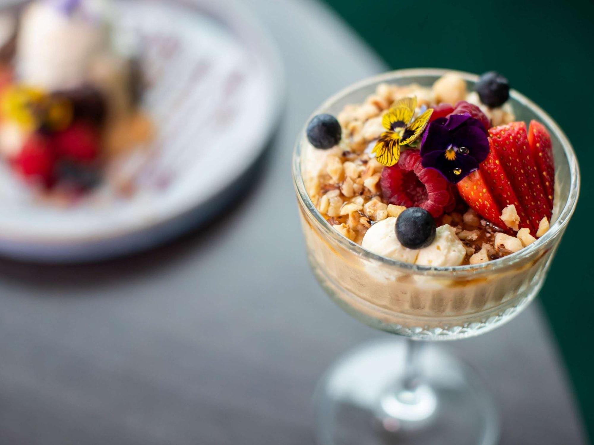Pullman Magenta Shores Resort Entrance Exterior photo A parfait with granola and fruit